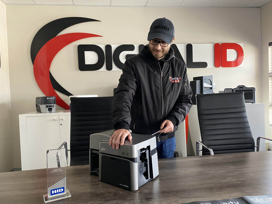 Digital ID technician servicing an ID card printer